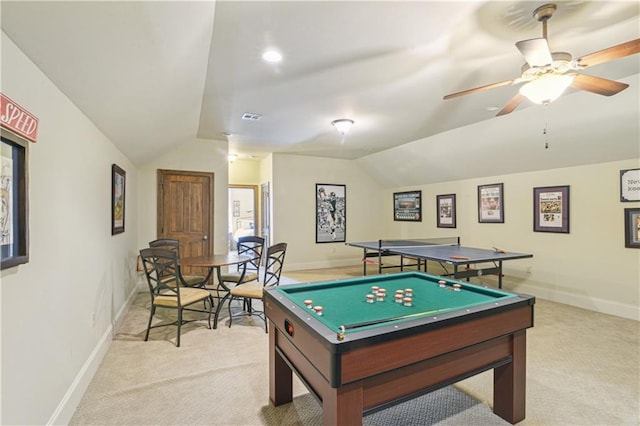 playroom featuring baseboards, light carpet, visible vents, and vaulted ceiling