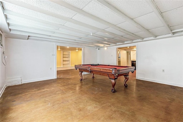 recreation room featuring finished concrete floors, billiards, and baseboards