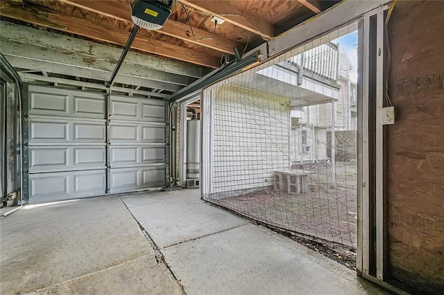 garage featuring a garage door opener and central AC