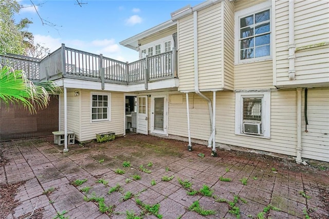 rear view of house featuring a patio