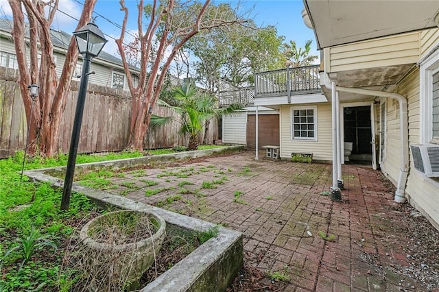 view of yard featuring a patio and fence