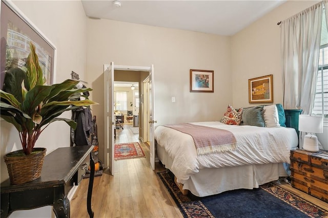bedroom with hardwood / wood-style flooring