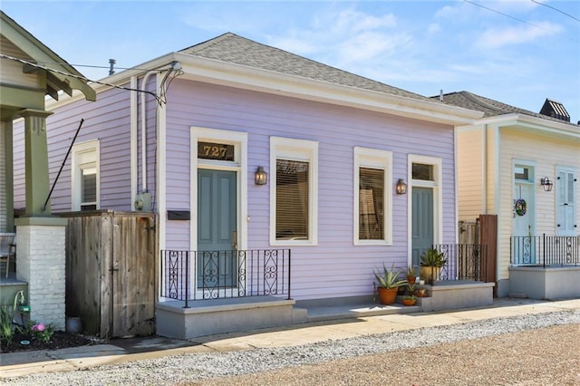 view of front of home featuring a shingled roof