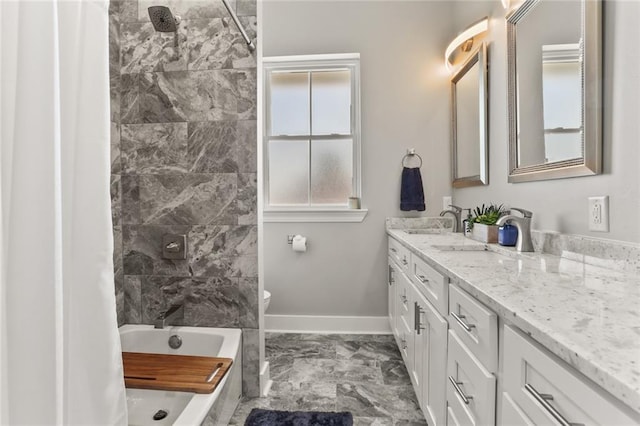 full bathroom with vanity, baseboards,  shower combination, toilet, and marble finish floor