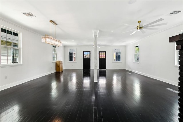 unfurnished living room with baseboards, wood finished floors, visible vents, and ceiling fan