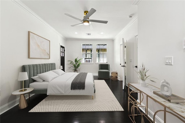 bedroom featuring visible vents, baseboards, ceiling fan, ornamental molding, and dark wood-type flooring