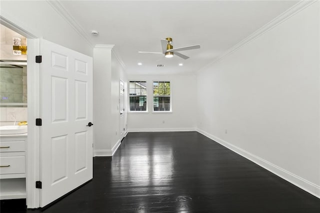 unfurnished room featuring dark wood finished floors, ceiling fan, baseboards, and ornamental molding