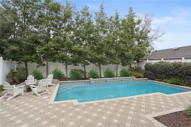 view of pool with a fenced in pool, a patio, and a fenced backyard