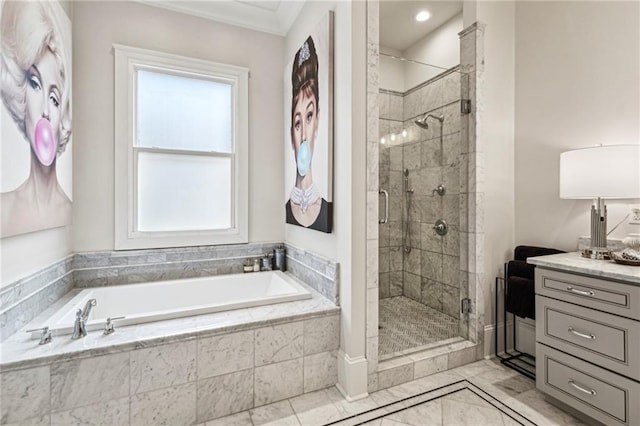 bathroom with a bath, a stall shower, vanity, and crown molding