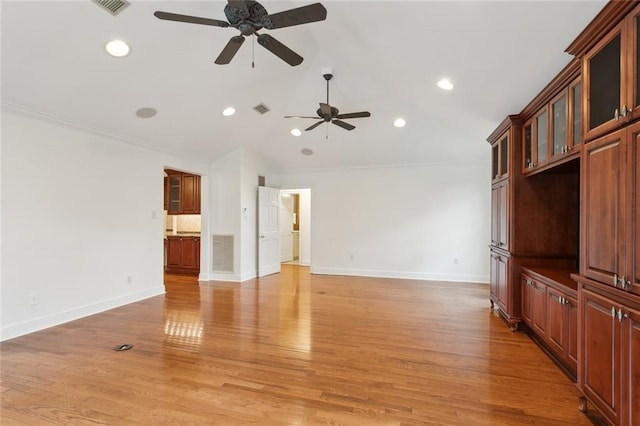 37 Spanish Fort Blvd, New Orleans, LA 70124 - unfurnished living room featuring visible vents, light wood-style flooring, baseboards, and lofted ceiling