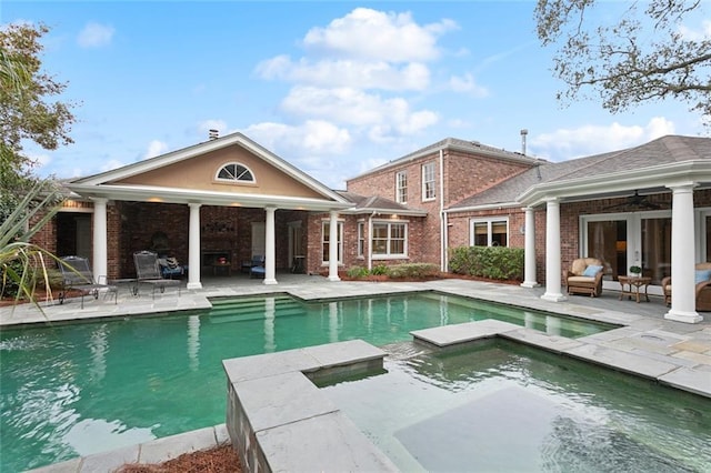 37 Spanish Fort Blvd, New Orleans, LA 70124 - view of pool featuring a pool with connected hot tub, french doors, a ceiling fan, and a patio