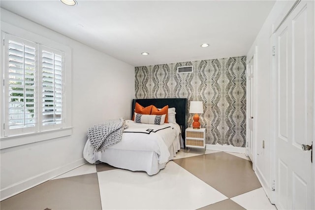 3205 Octavia St, New Orleans, LA 70125 - bedroom featuring an accent wall, recessed lighting, baseboards, and wallpapered walls