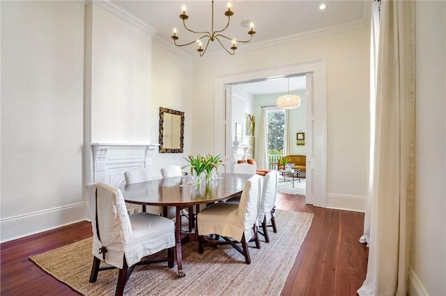 dining area with a chandelier, baseboards, wood-type flooring, and ornamental molding