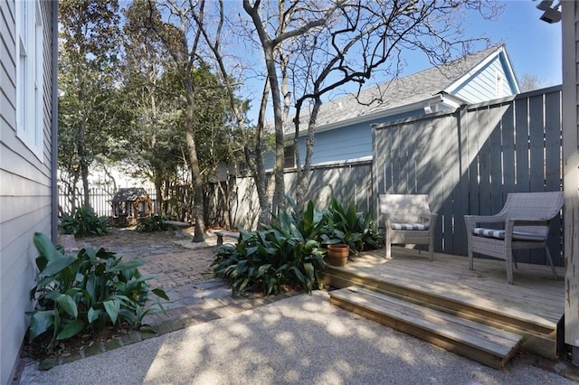 exterior space featuring a patio area and a fenced backyard