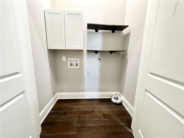clothes washing area featuring baseboards, dark wood-type flooring, cabinet space, washer hookup, and hookup for an electric dryer