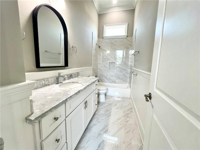 full bathroom with wainscoting, shower / washtub combination, vanity, toilet, and ornamental molding