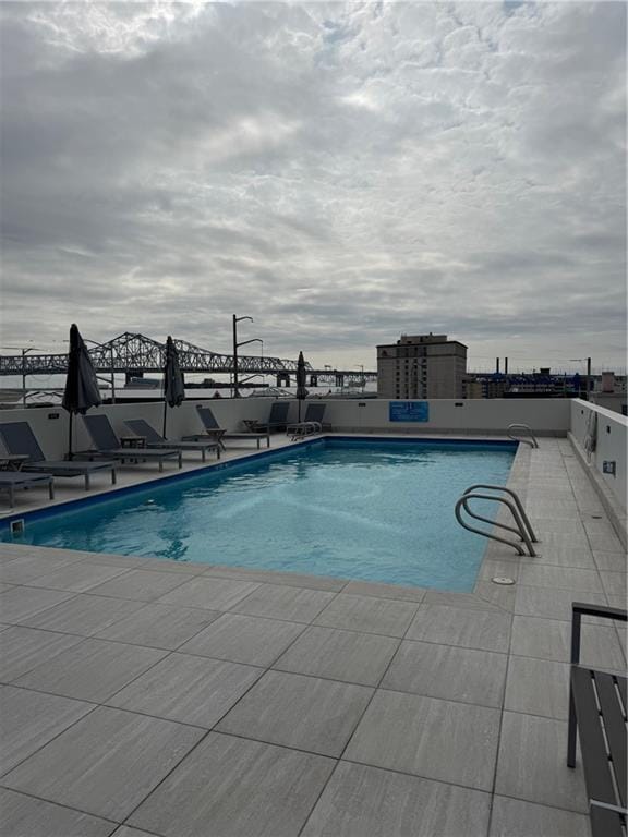 community pool with a patio