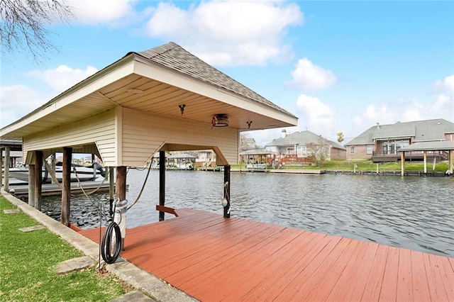 view of dock with a water view