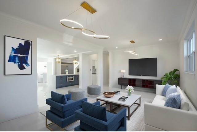 living room featuring recessed lighting and a chandelier