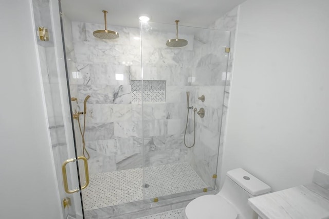 full bath featuring a marble finish shower and toilet