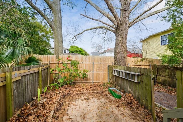 view of yard featuring a fenced backyard