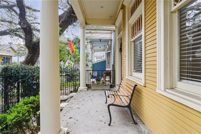 view of patio / terrace featuring fence