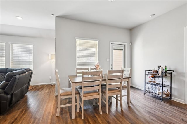 dining space with recessed lighting, baseboards, and dark wood-style flooring