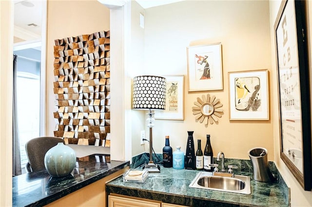 bar featuring a sink and wet bar