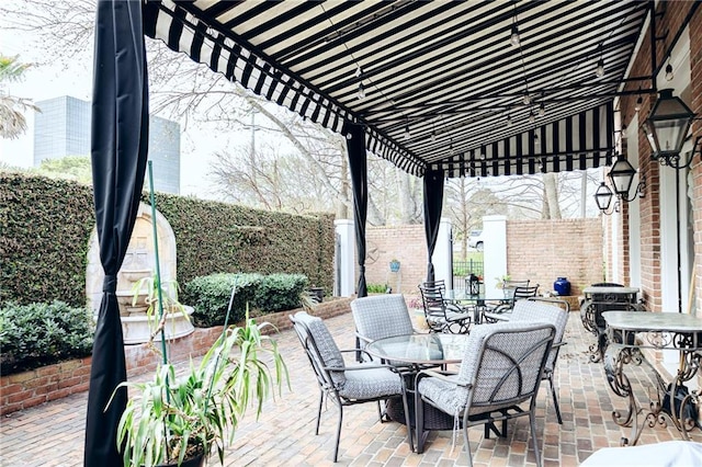 view of patio featuring outdoor dining space