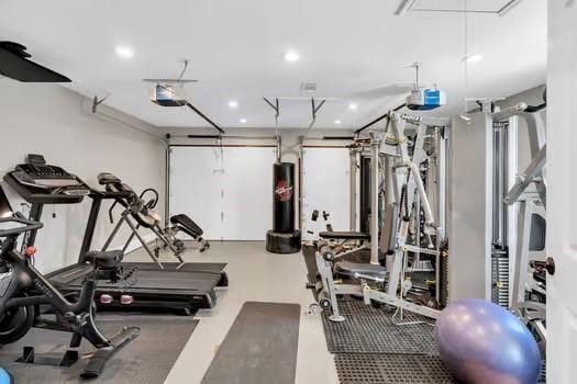 workout area with recessed lighting and water heater