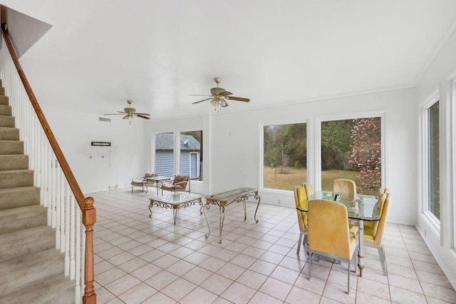 interior space featuring a ceiling fan
