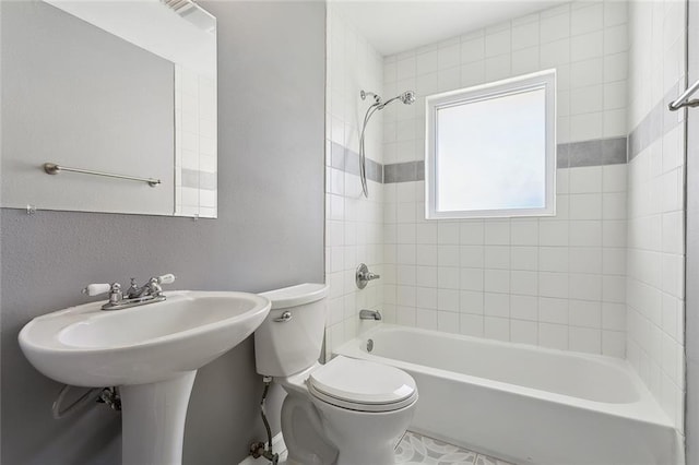 full bathroom with toilet and shower / bathtub combination