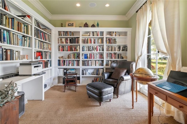 living area featuring recessed lighting, carpet floors, ornamental molding, and wall of books