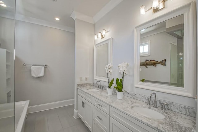 bathroom featuring a sink, baseboards, a shower, and double vanity