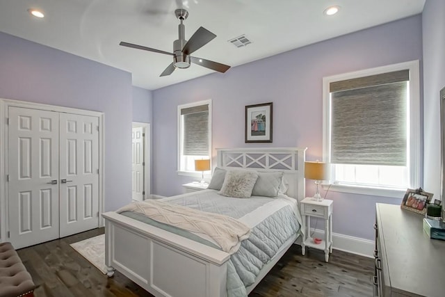 bedroom featuring a closet, visible vents, recessed lighting, and dark wood-type flooring