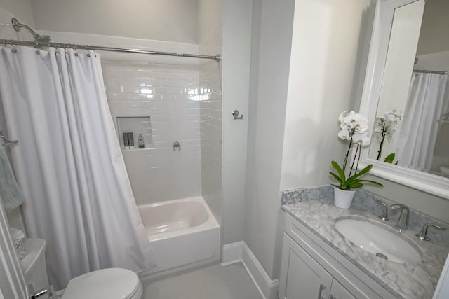 full bath with baseboards, vanity, toilet, and shower / tub combo with curtain