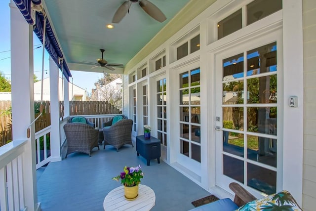 exterior space with ceiling fan