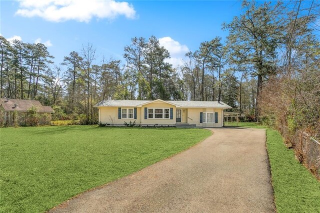 72462 Wilkinson St, Covington, LA 70435 - ranch-style house with crawl space, aphalt driveway, and a front lawn