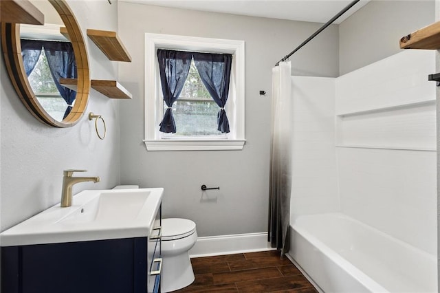 full bathroom with toilet, wood tiled floor, shower / bath combination with curtain, baseboards, and vanity