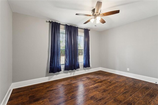 72462 Wilkinson St, Covington, LA 70435 - spare room featuring wood finished floors, baseboards, and ceiling fan