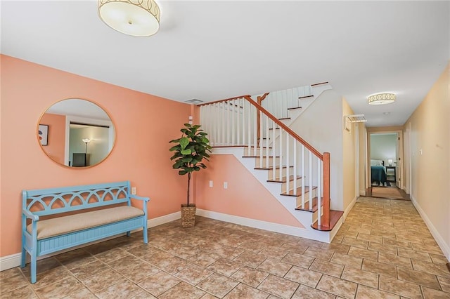 interior space with visible vents and baseboards