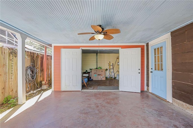 view of patio / terrace featuring a ceiling fan and fence