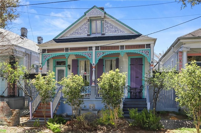 victorian home featuring covered porch