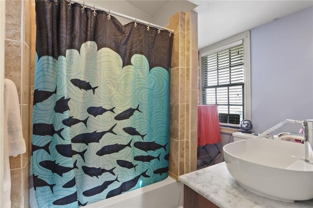 bathroom featuring vanity and shower / bath combination with curtain
