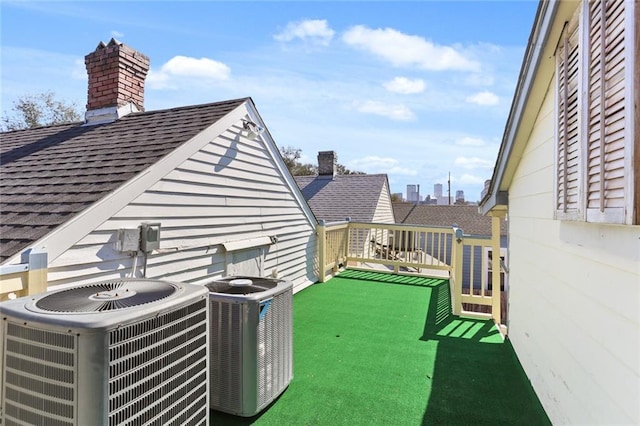 view of yard with central air condition unit