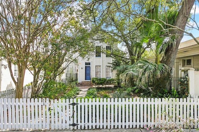 obstructed view of property with fence