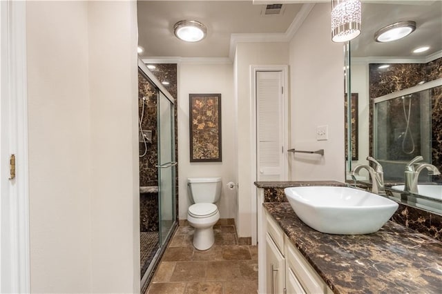 full bathroom with visible vents, toilet, a shower stall, and crown molding