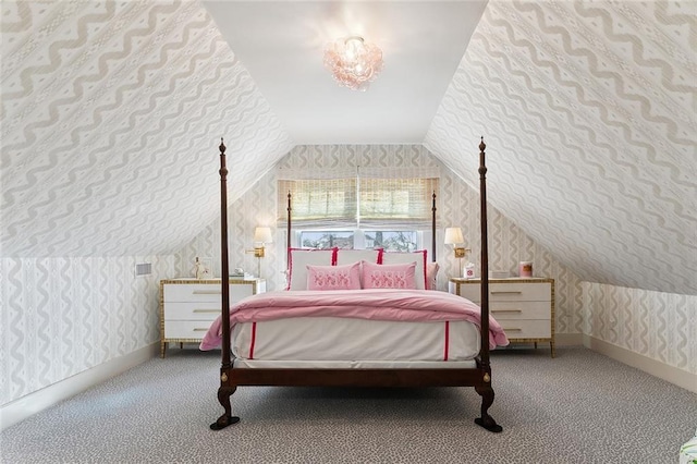 bedroom with wallpapered walls, vaulted ceiling, carpet flooring, and baseboards