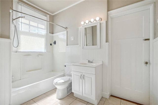 full bathroom featuring vanity, washtub / shower combination, a wainscoted wall, tile patterned floors, and toilet