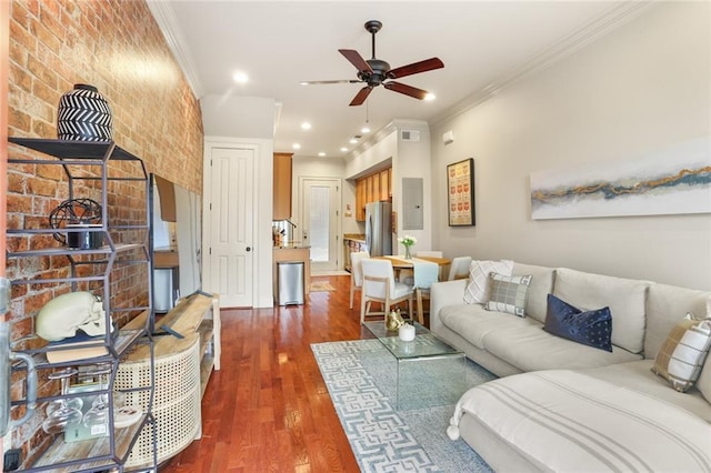 living area with visible vents, dark wood-type flooring, ceiling fan, ornamental molding, and recessed lighting